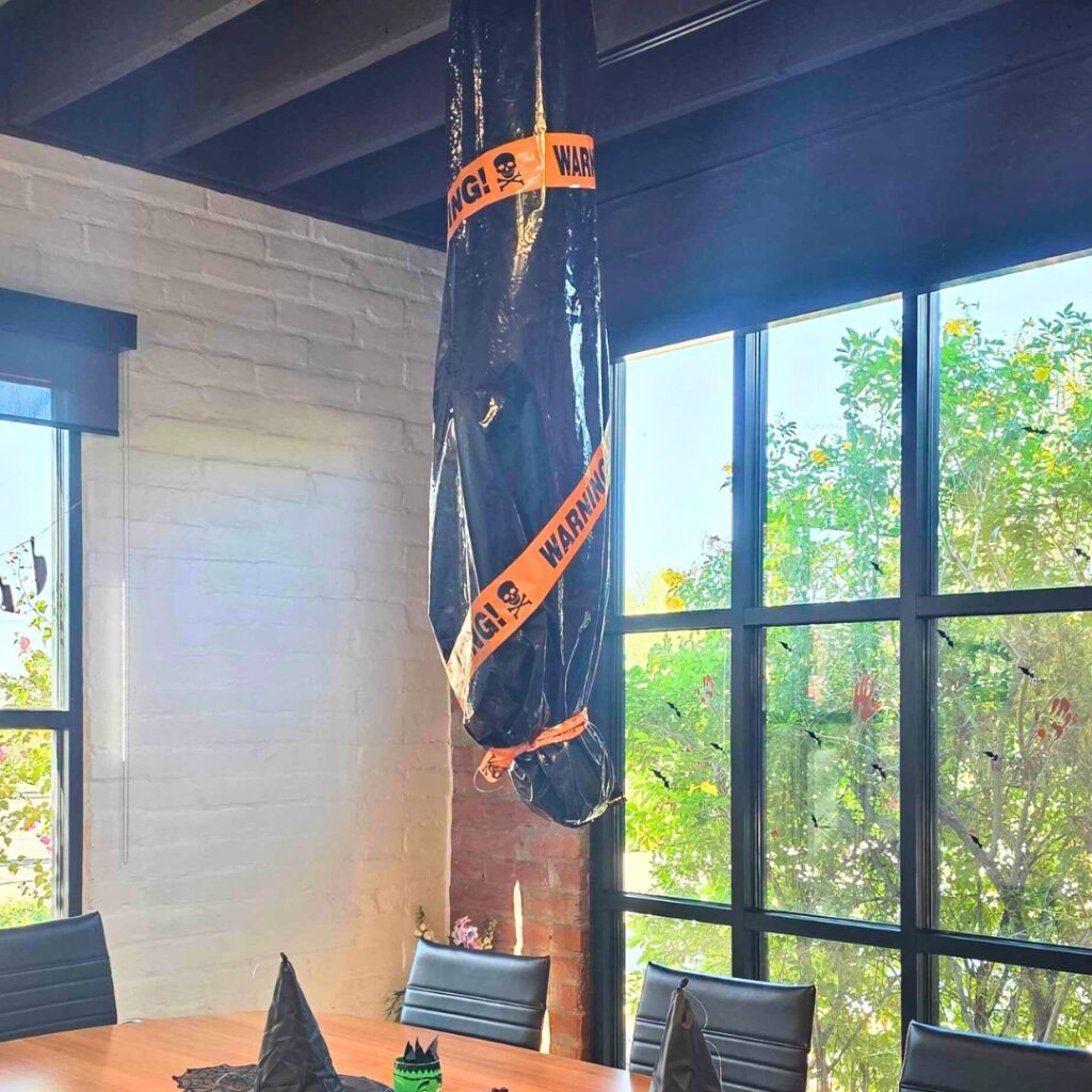 Fake dead body hanging in the Good JuJu conference room